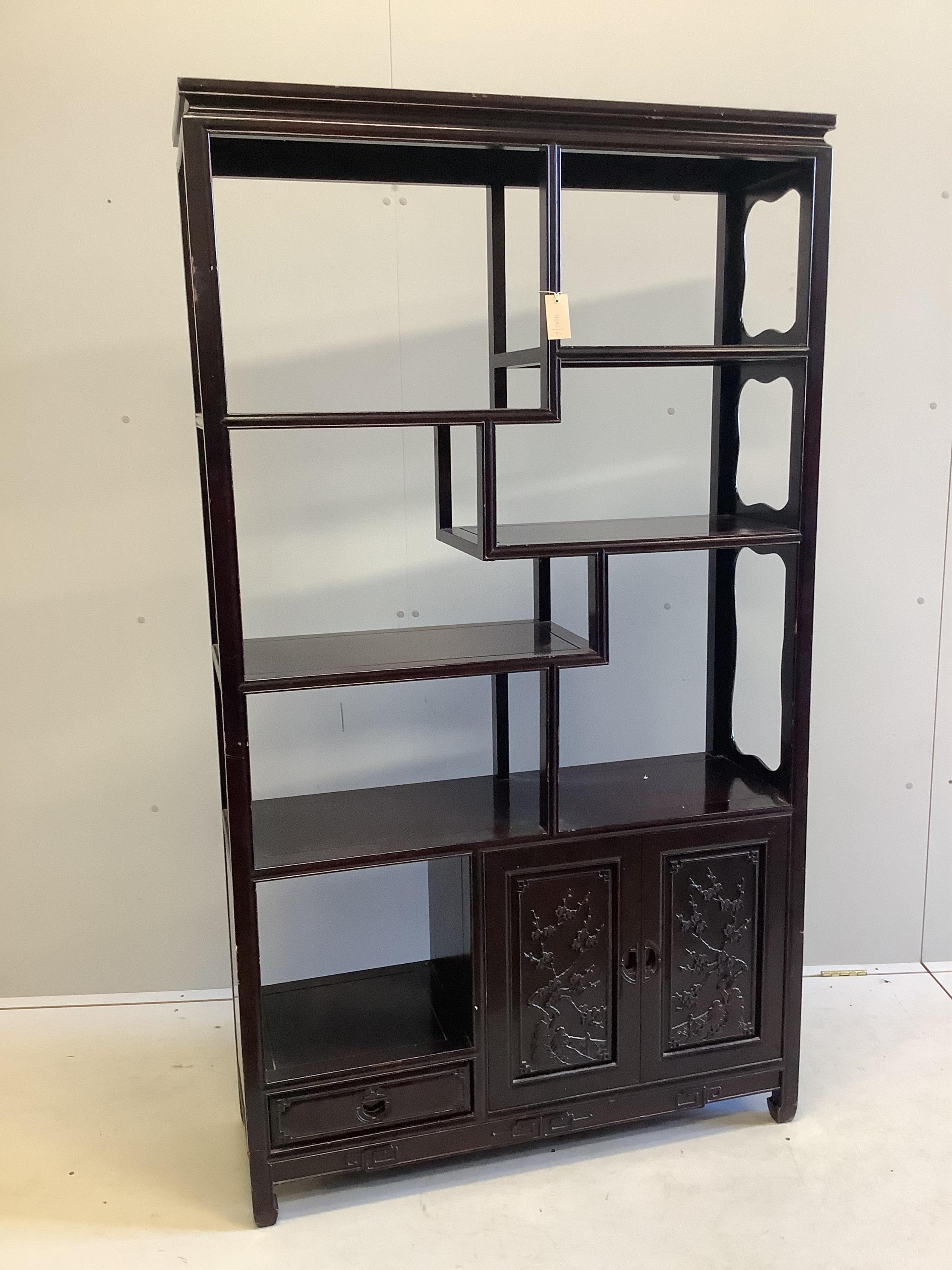 A Chinese hardwood open display unit, width 101cm, depth 33cm, height 179cm. Condition - fair